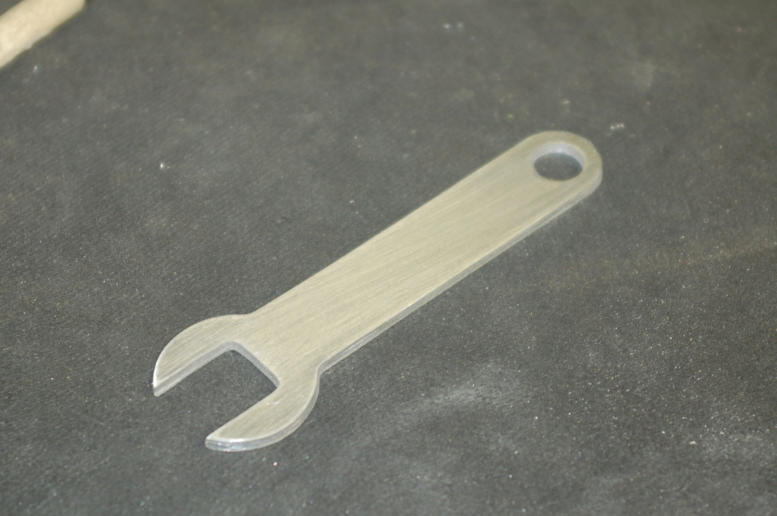 Sanded CNC router cut aluminum wrench