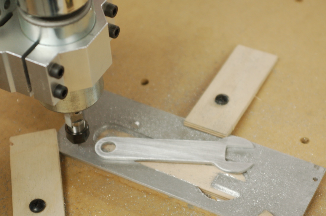 CNC Router cutting an anuminum wrench